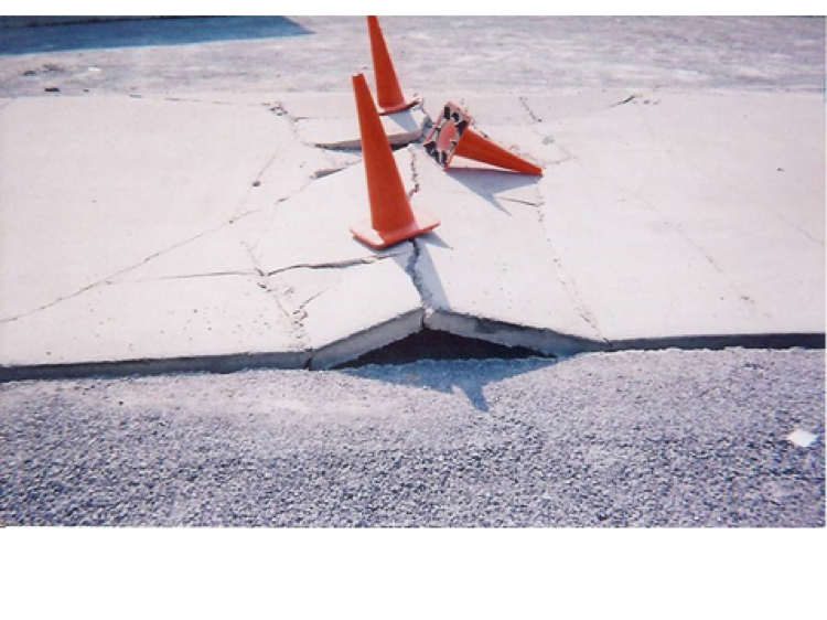 Other terms for concrete blow-up include: buckling and tenting. Although the concrete doesn’t actually explode and blow-up, the pavement does lift (buckles or tents) up off of the subgrade.